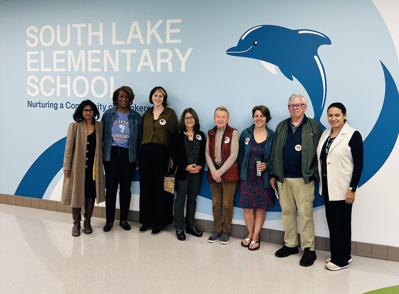 Temple Beth Ami members Debbie Jacobs and Susan Stern with members from AIM (Action in Montgomery) and Asbury Village getting ready for a tour of the newly completed South Lake school. All three groups worked together to advocate for the school's needed replacement.