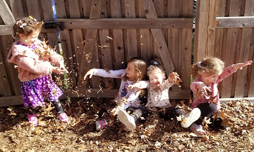 Kids Playing in Leaves